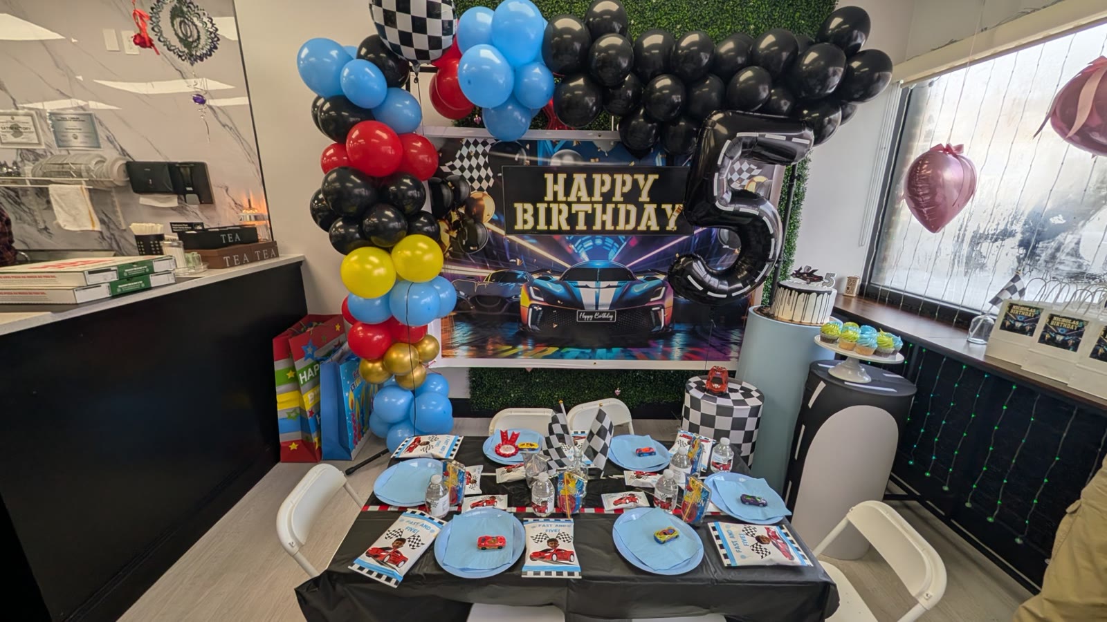 Race car themed birthday party room at JJ's